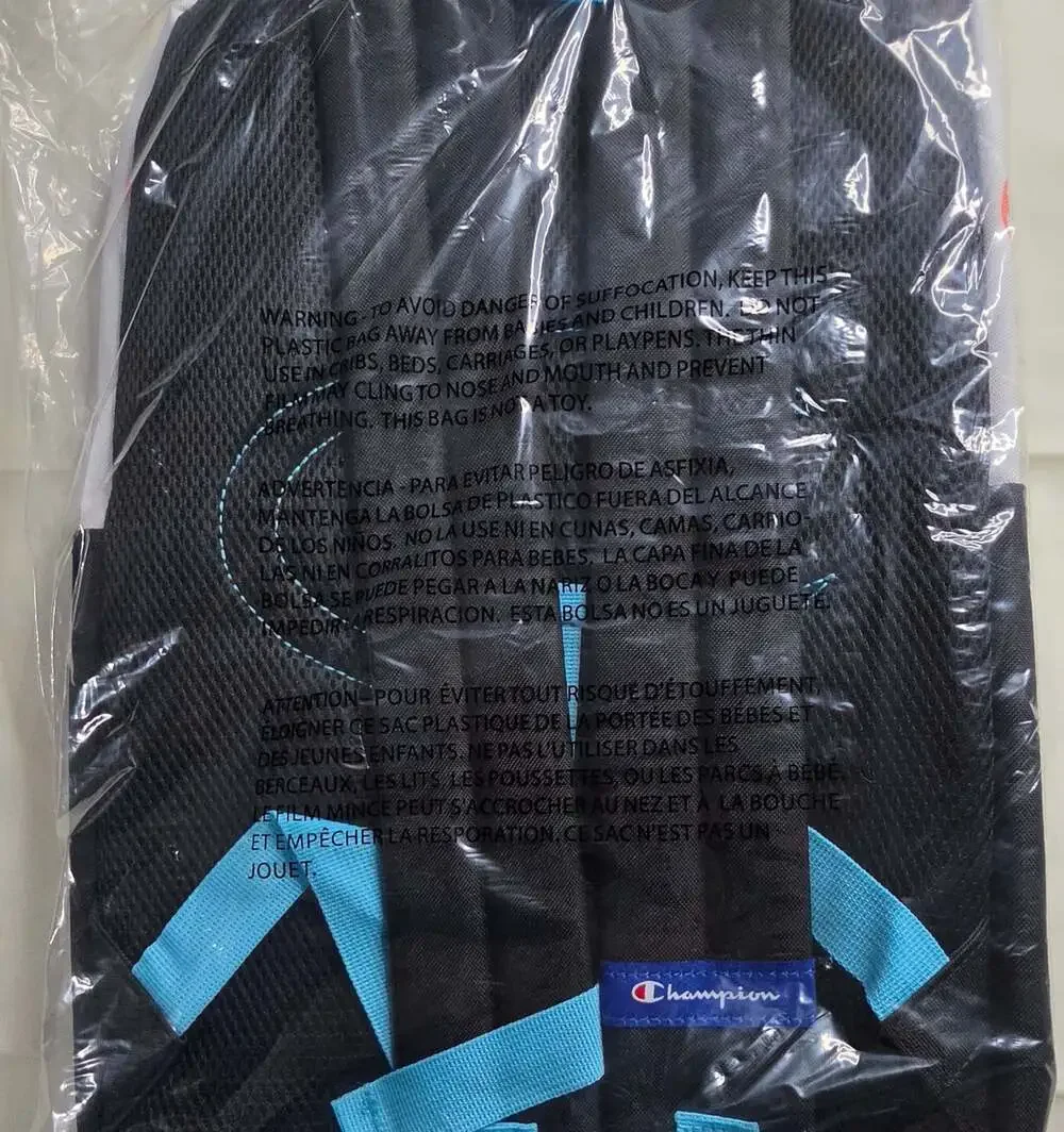 Champion Youthquake Backpack in White and Black with Multicolor Logo Print